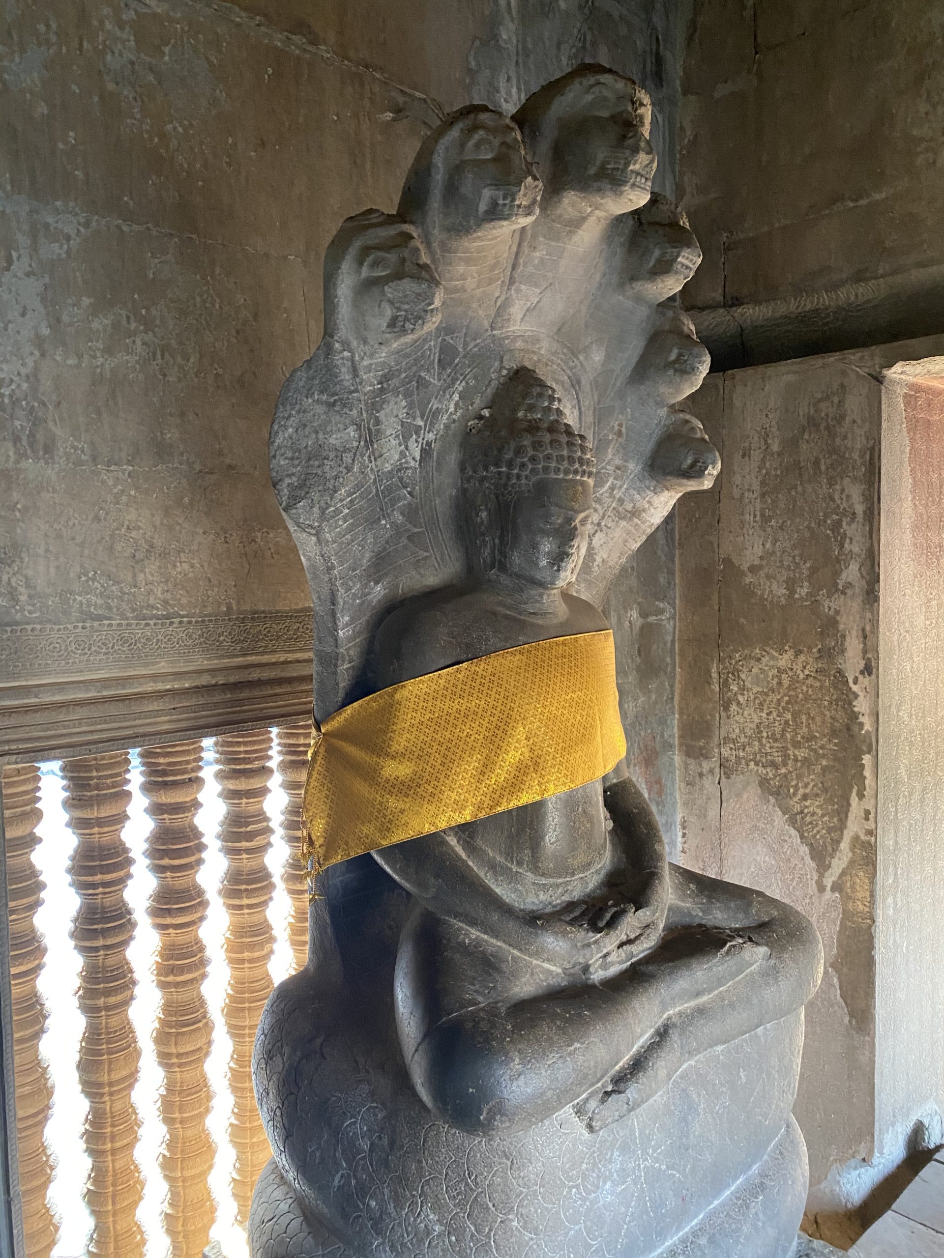 buddha statue at angkor wat temple crows nest retreats
