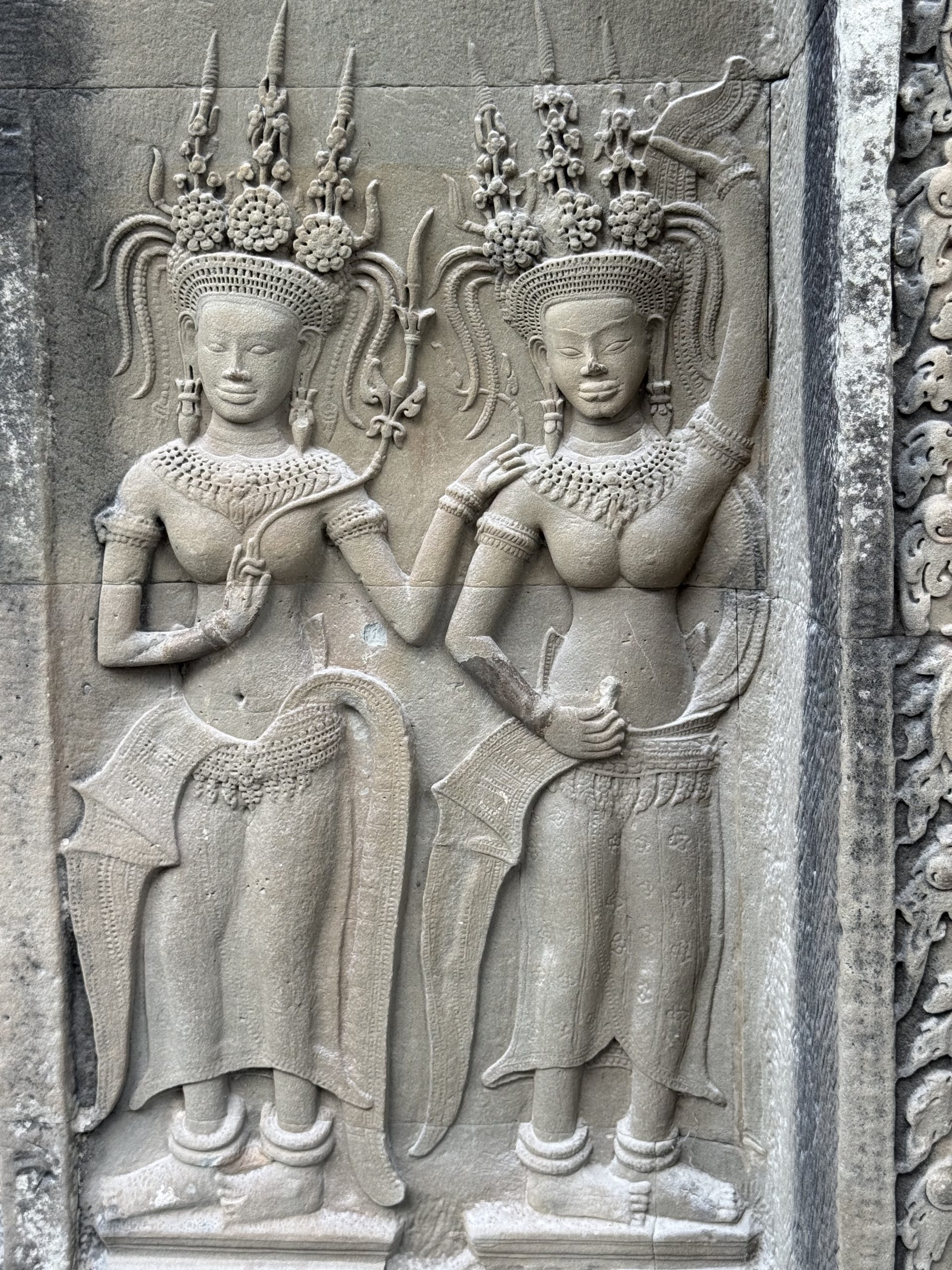 Apsara carved into the walls of Angkor Wat