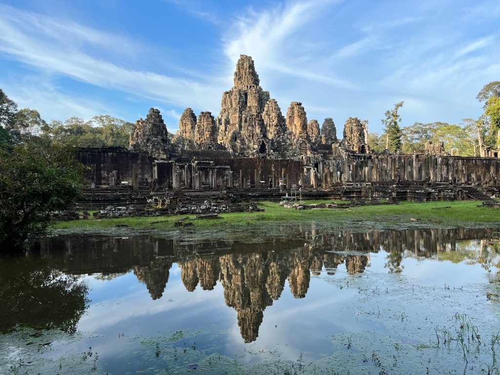 forest of stone faces guarding the spirit of cambodia crows nest retreats